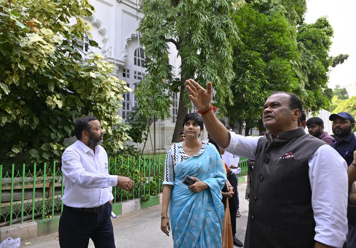 Telangana Roads and Buildings Minister Komatireddy Venkat Reddy inspects the works taken up to restore the 110-year-old heritage building in the Assembly premises in Hyderabad on Tuesday.