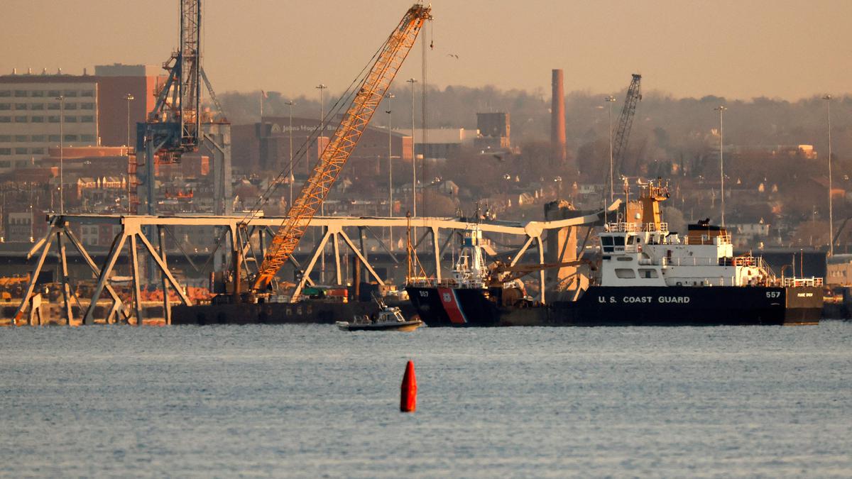 Cranes arrive to start removing wreckage from deadly Baltimore bridge collapse