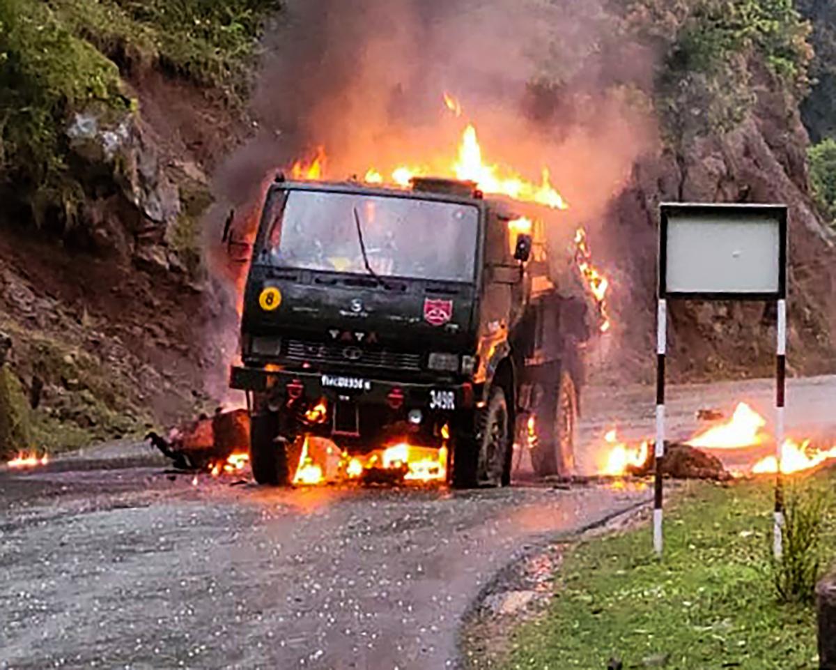 An army vehicle catches fire after a terrorist attack at Mendhar in Poonch district, Thursday, April 20, 2023.  Five soldiers were killed and another was seriously injured in the attack. 