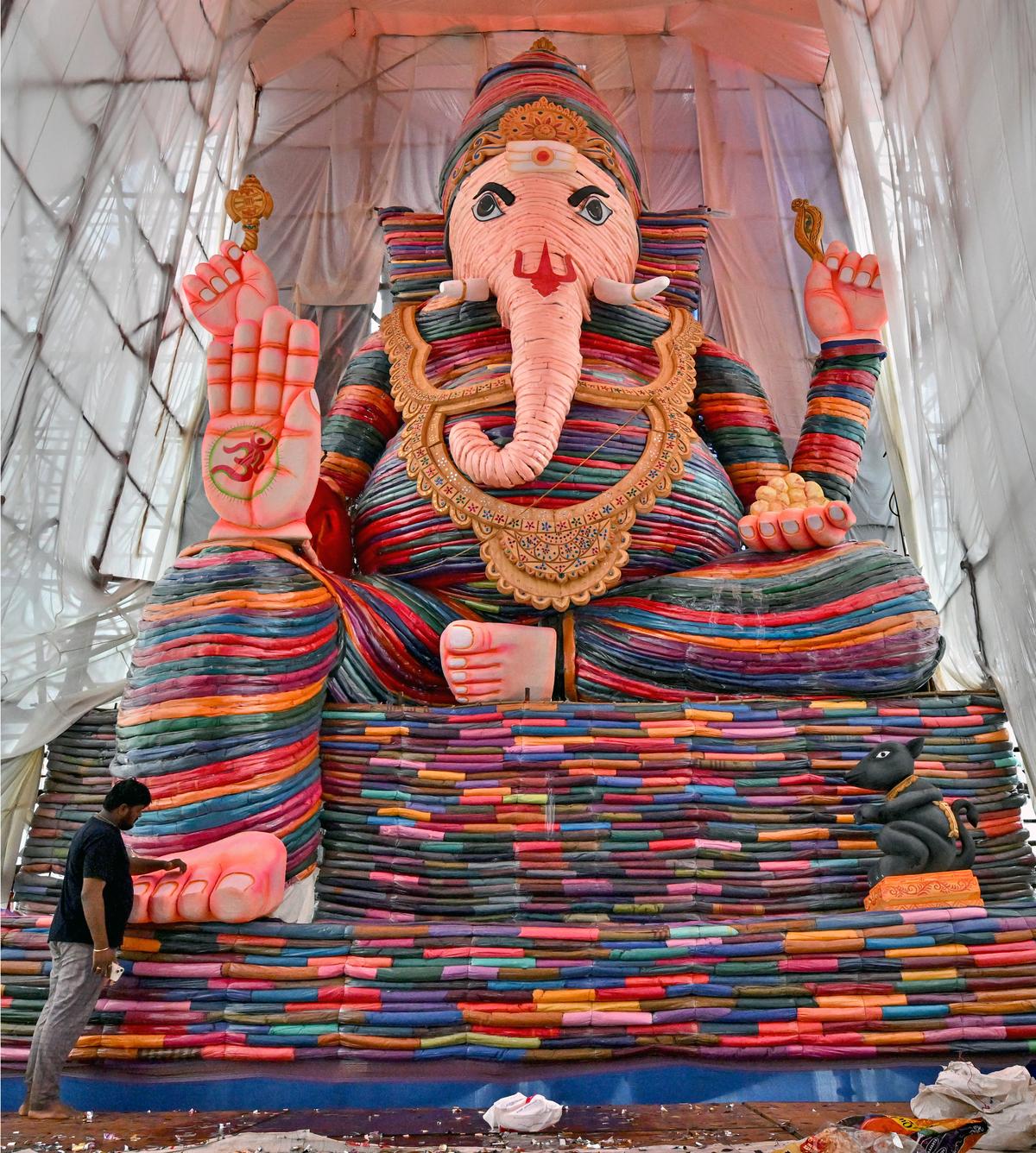 Ganesh idol made using one lakh sarees in Lanka Grounds at Gajuwaka in Visakhapatnam. Ganesh idol made using one lakh sarees in Lanka Grounds at Gajuwaka in Visakhapatnam.