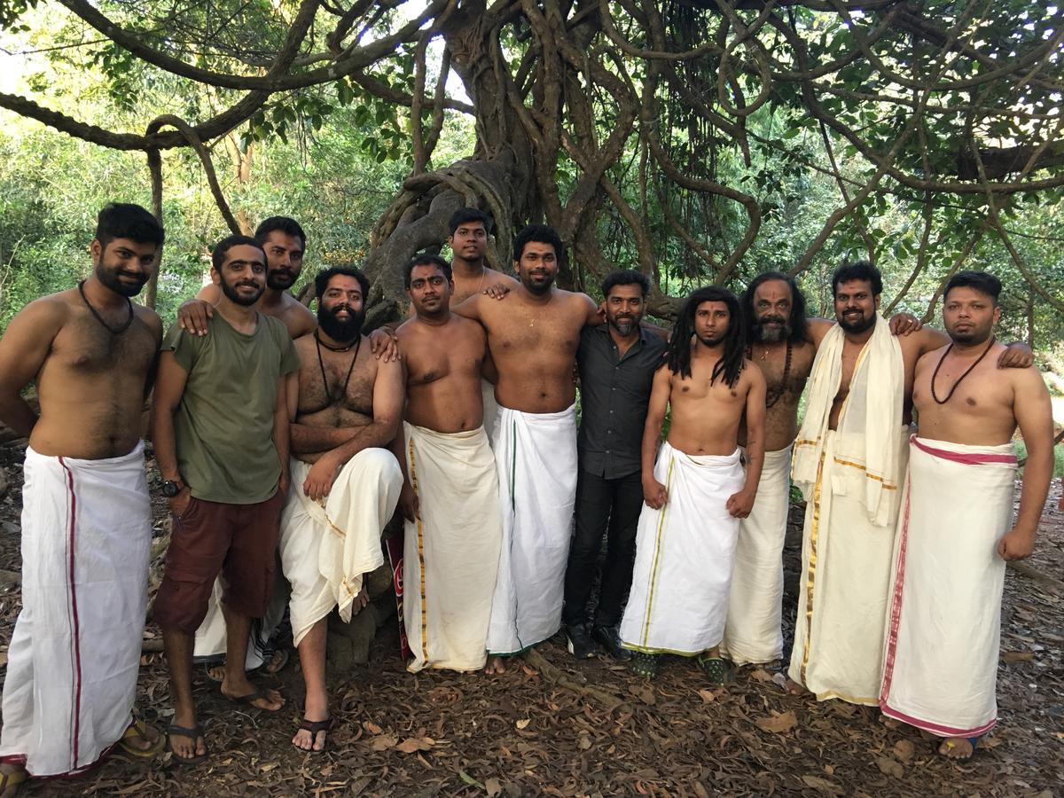 Little Swamp (second from left) with the members of Thikkudam Bridge during the making of the 'Navarasam' music video.