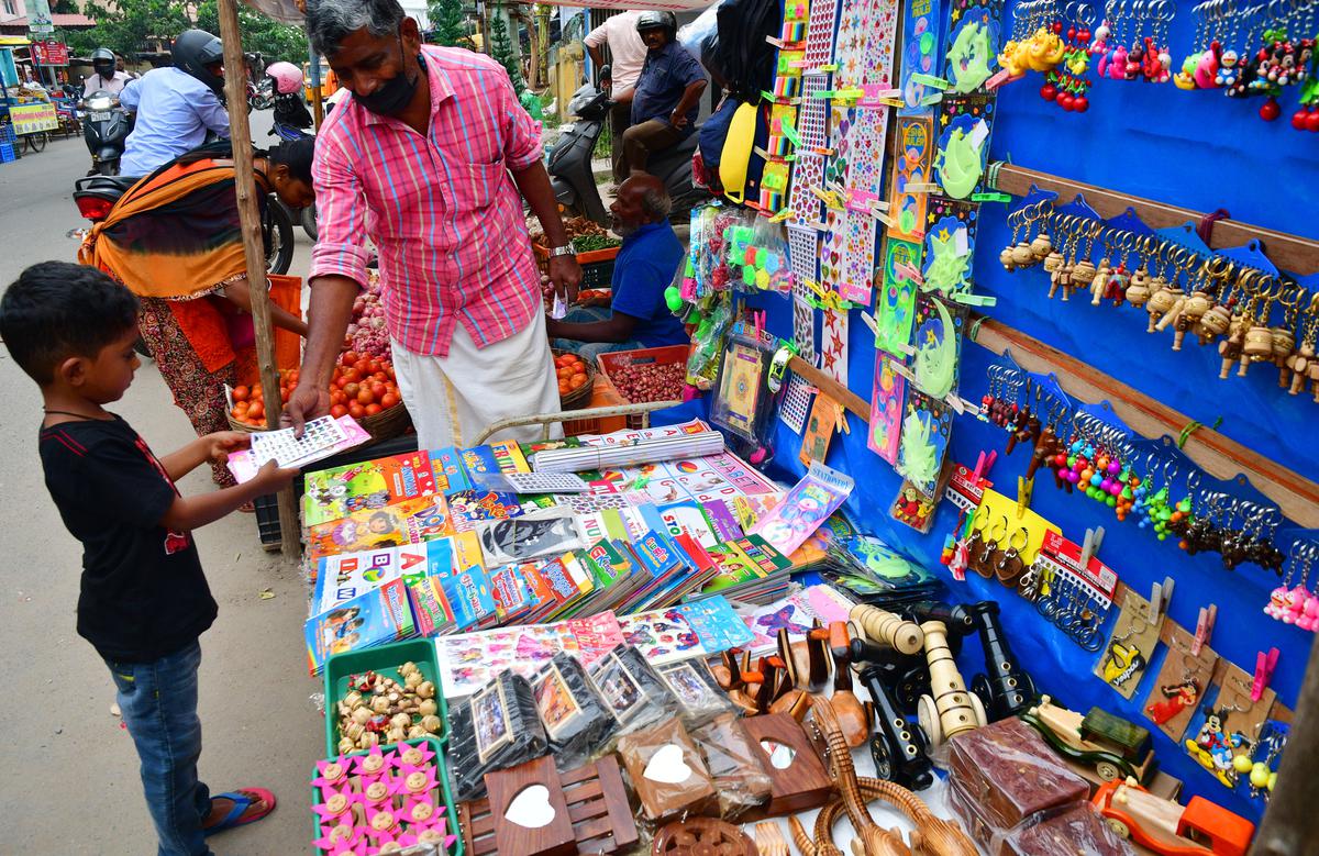 Scenes from the weekly Tuesday market that now features Christmas decorations and trees