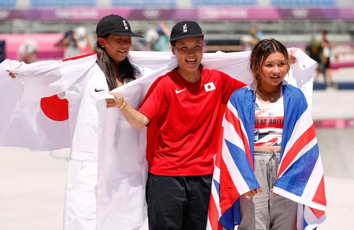 Women’s Skateboarding Park medallists (l to r) Kokona Hiraki (silver) and Sakura Yosozumi (gold) of Team Japan and Sky Brown (bronze) of Great Britain, at the Tokyo Olympics 2020.