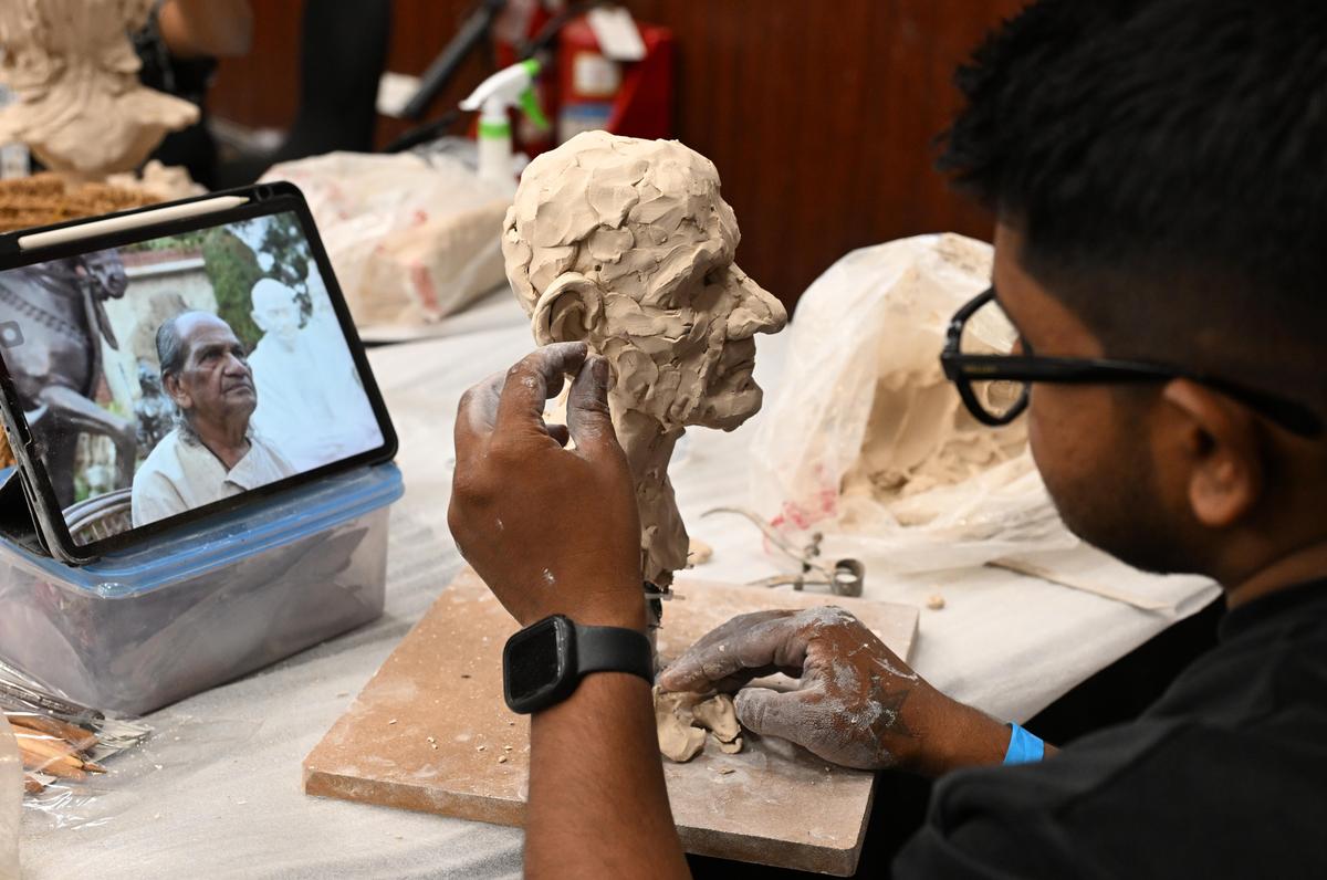 Participants make a clay portrait of renowned sculptor Ram V. Sutar during GAFX 2026 held at Lalit Ashok in Bengaluru on February 27, 2026.