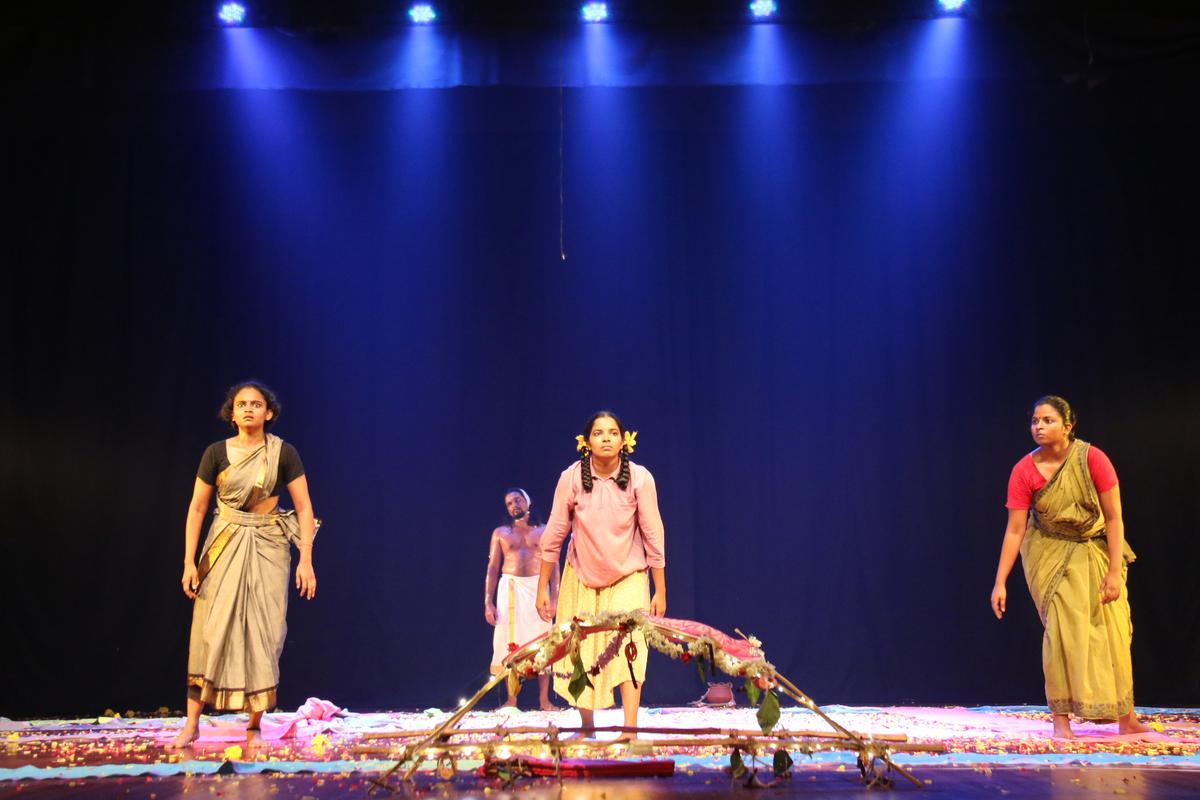 A scene from the play Nada Paavaadai.