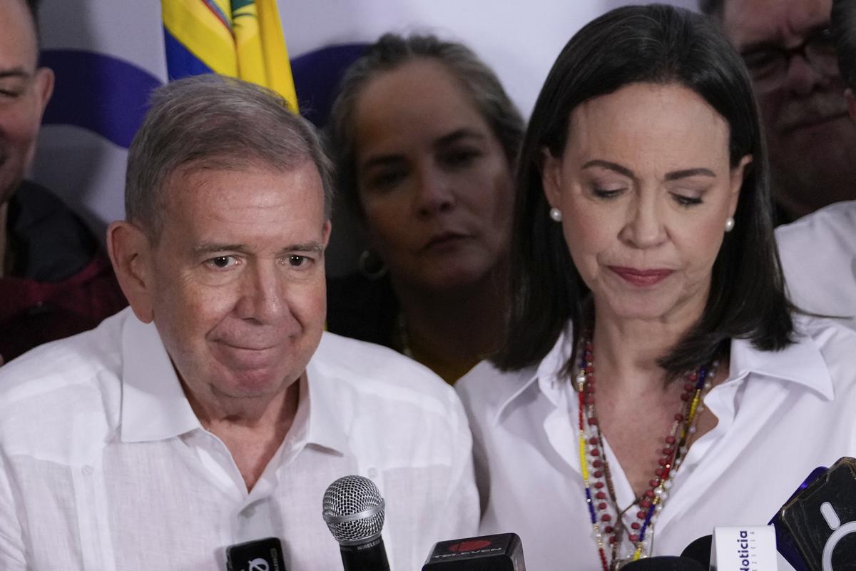 Opposition leader Maria Corina Machado, right, and presidential candidate Edmundo Gonzalez hold a news conference after electoral authorities declared President Nicolas Maduro the winner of the presidential election in Caracas, Venezuela, July 29, 2024. 