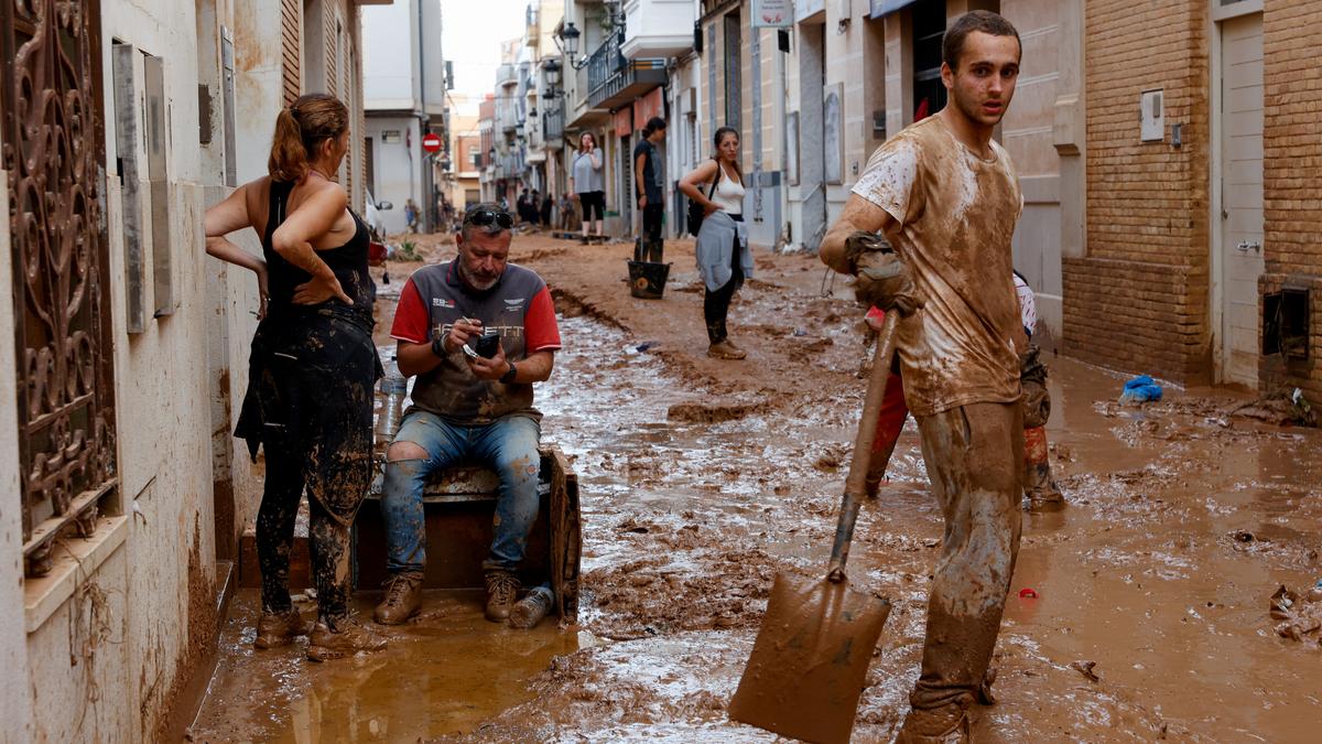 Spain searches for bodies after unprecedented flooding claims more than 150 lives