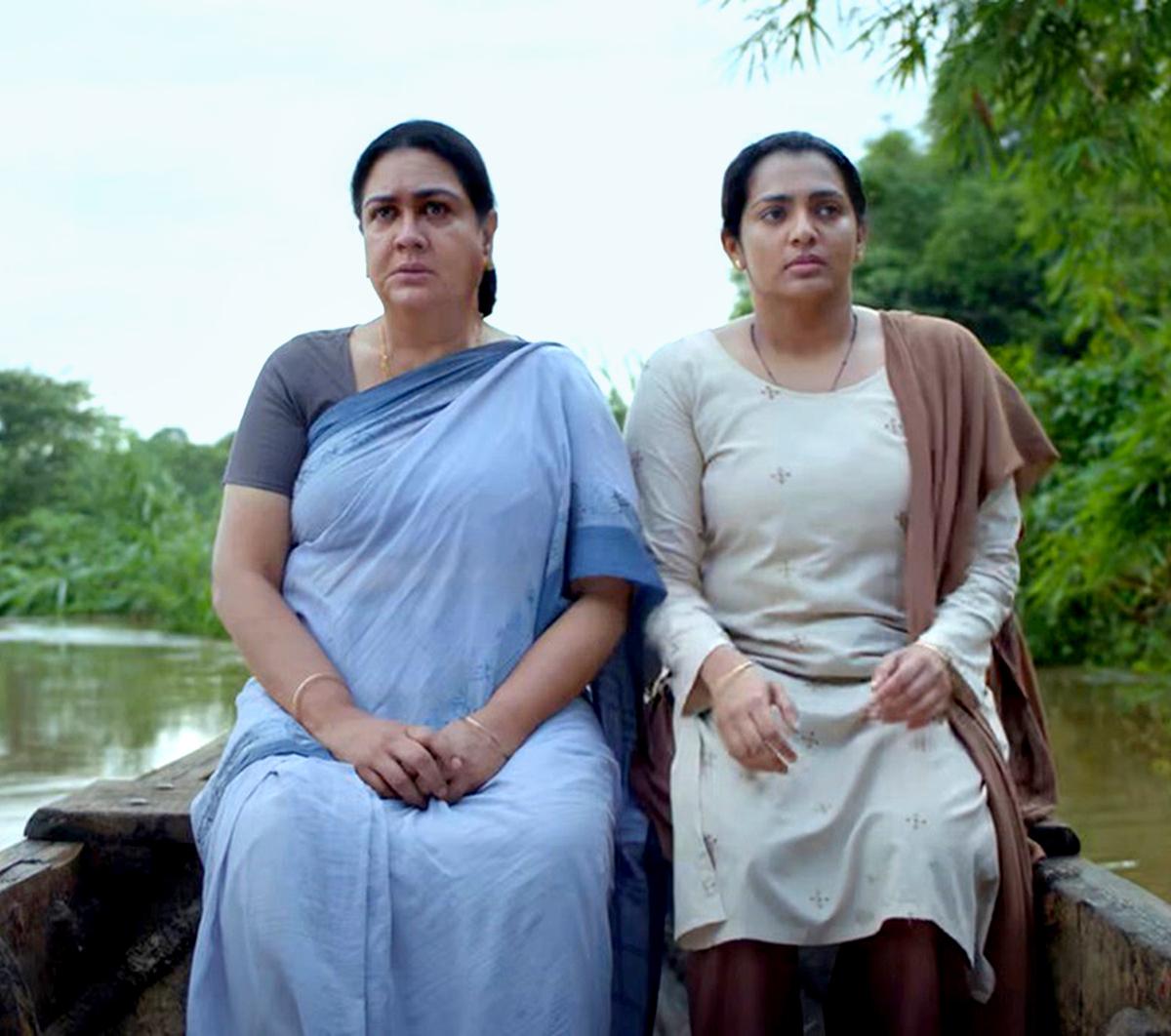 Urvashi and Parvathy Thiruvothu in a still from Ullozhukku, directed by Christo Tomy. 