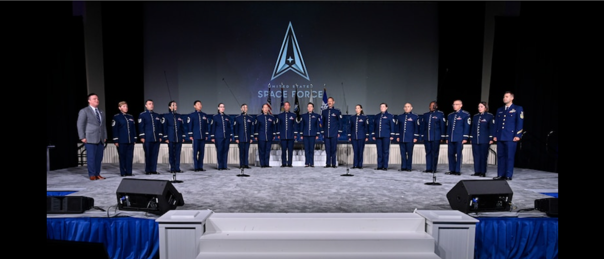 Air Force Band members and guests sing the new U.S. Space Force service song during the 2022 Air, Space and Cyber Conference in National Harbor, Md., Sept. 20, 2022