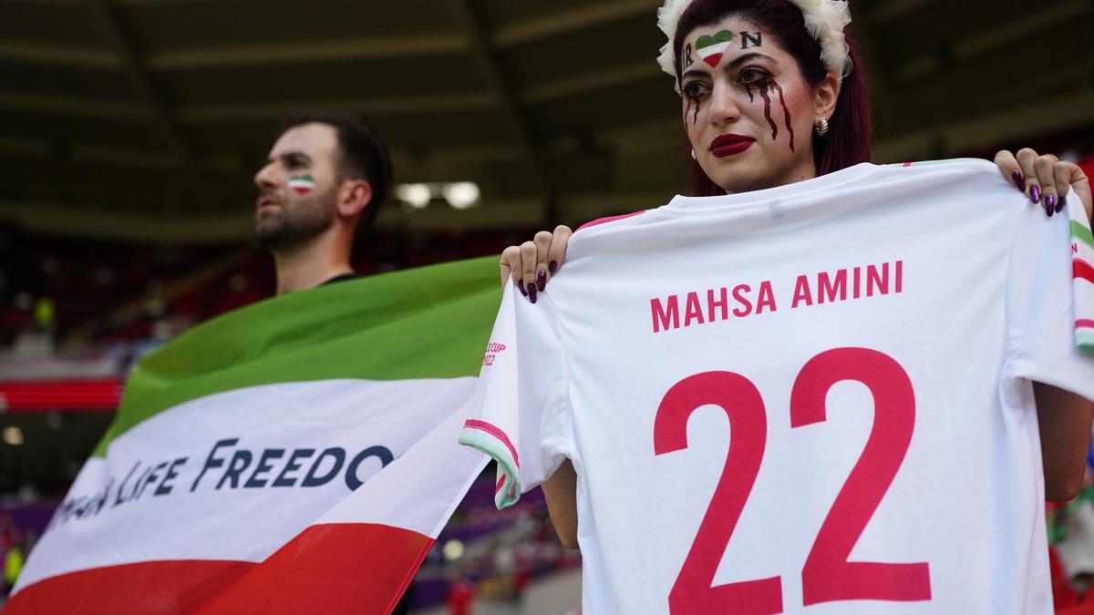 Iran regime supporters confront protesters at World Cup game