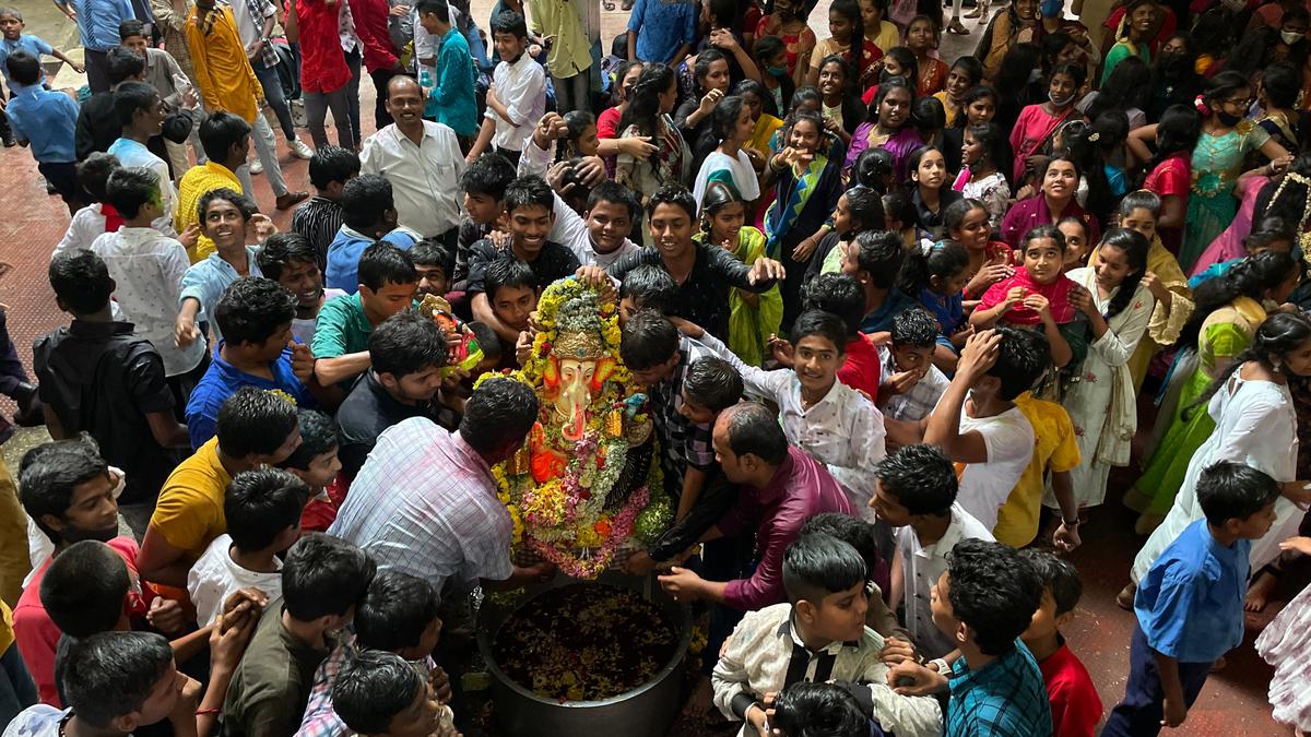 Students and teachers celebrating Ganesh Chaturthi at BBMP High School, Ganganagar, on Thursday: 