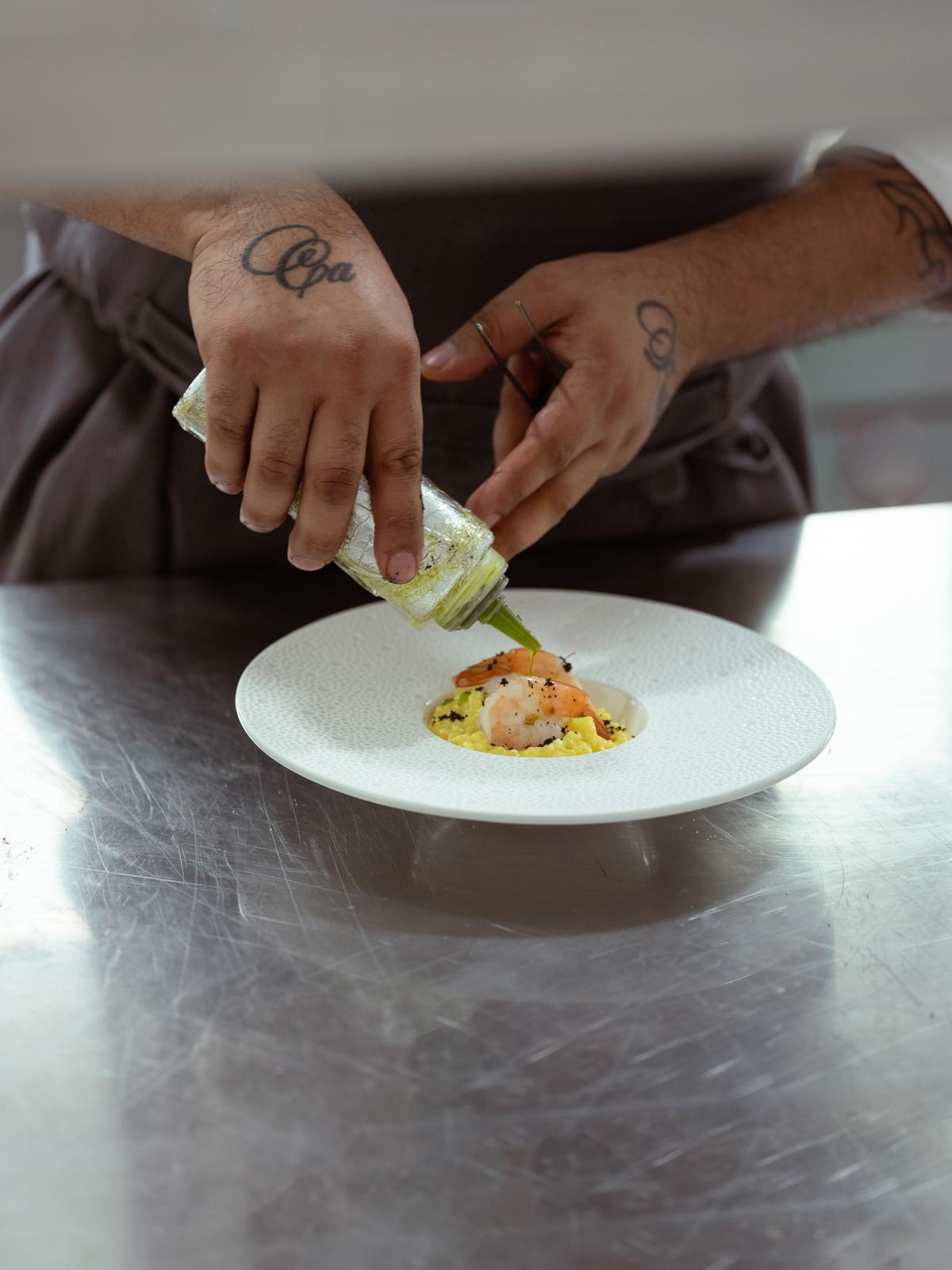 The Hamachi ceviche gets the final touch by Chef Priyam Chatterjee at The Leela in Hyderabad