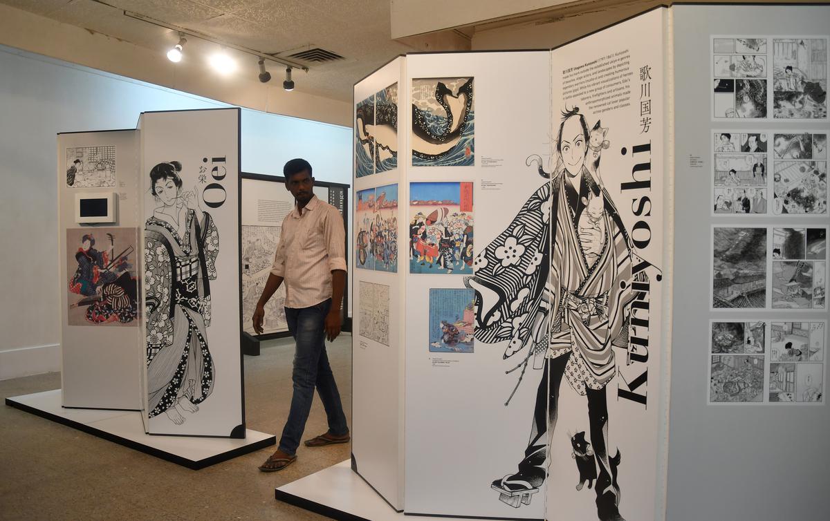 Visitors look at the Manga Hokusai Exhibition at Lalit Kala Akademi in Chennai on Tuesday.