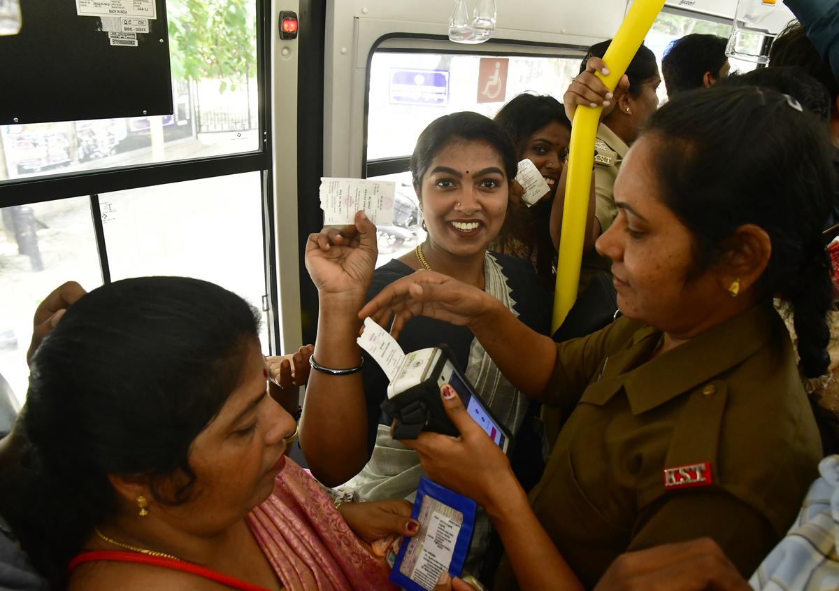 A conductor issuing “free tickets” to women on a BMTC bus in Bengaluru.
