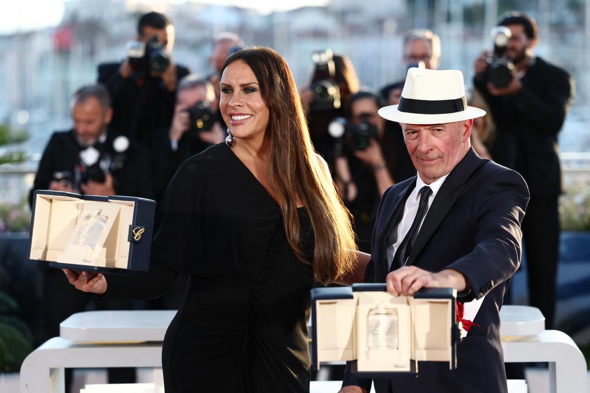 Karla Sofia Gascon, co-winner with Zoe Saldana, Selena Gomez and Adriana Paz of the Best Actress award, and Director Jacques Audiard, Jury Prize award winner for the film “Emilia Perez”, pose during a photocall after the closing ceremony of the 77th Cannes Film Festival in Cannes, France, May 25, 2024.