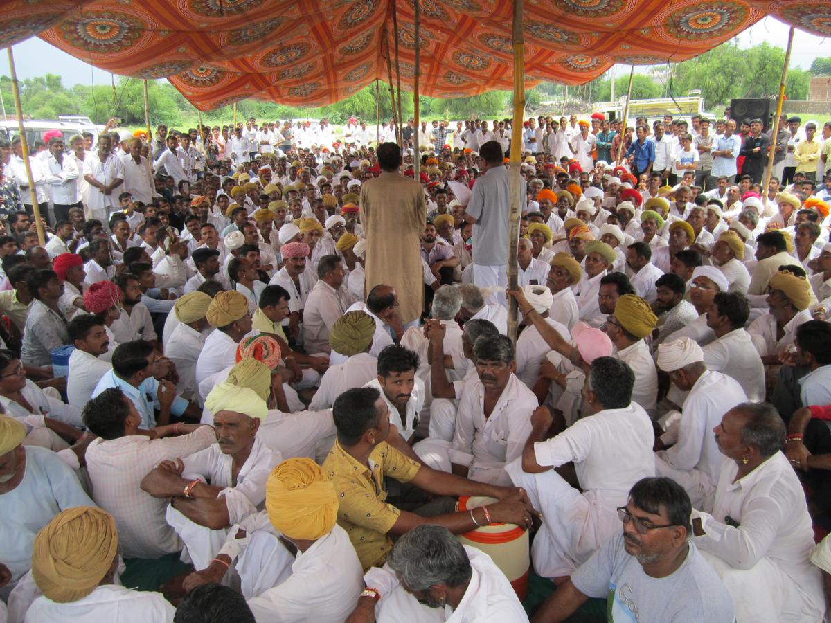 Members of the upper castes protesting against the arrest of school principal Chail Singh in Surana.