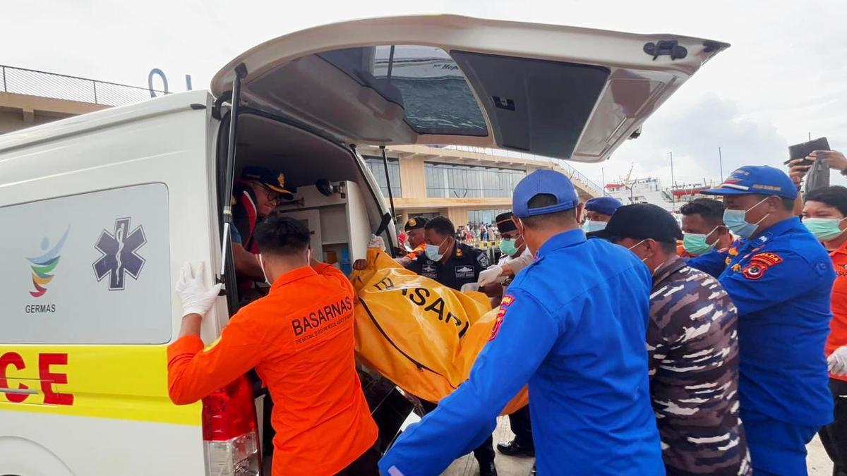 Indonesian rescuers find body while searching for Spanish soccer coach, three children