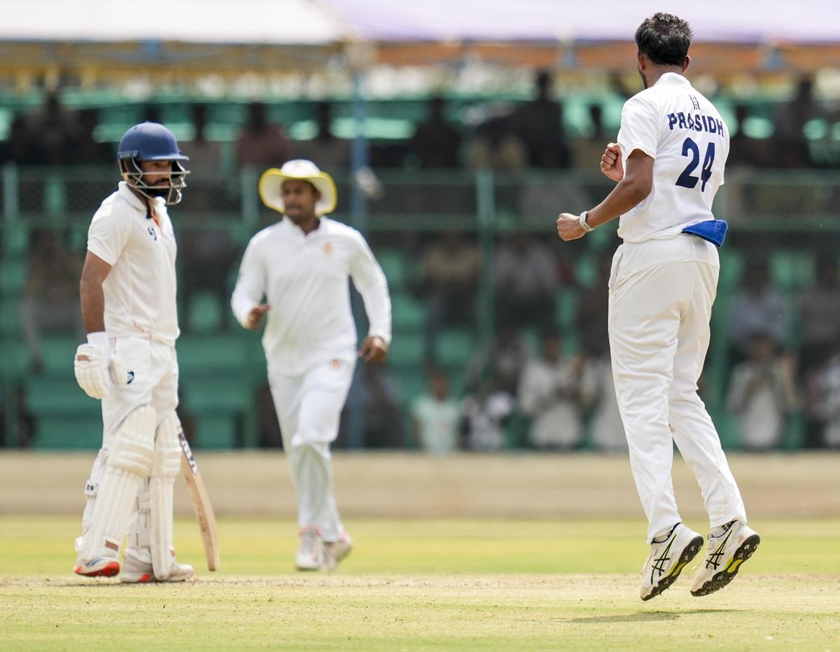 Karnataka's Prasidh Krishna celebrates after claiming the wicket of Jammu & Kashmir's Yawer Hassan on the first day of the Ranji Trophy final cricket match between Karnataka and Jammu & Kashmir, at KSCA Cricket Stadium, in Hubballi, Karnataka, on February 24, 2026.