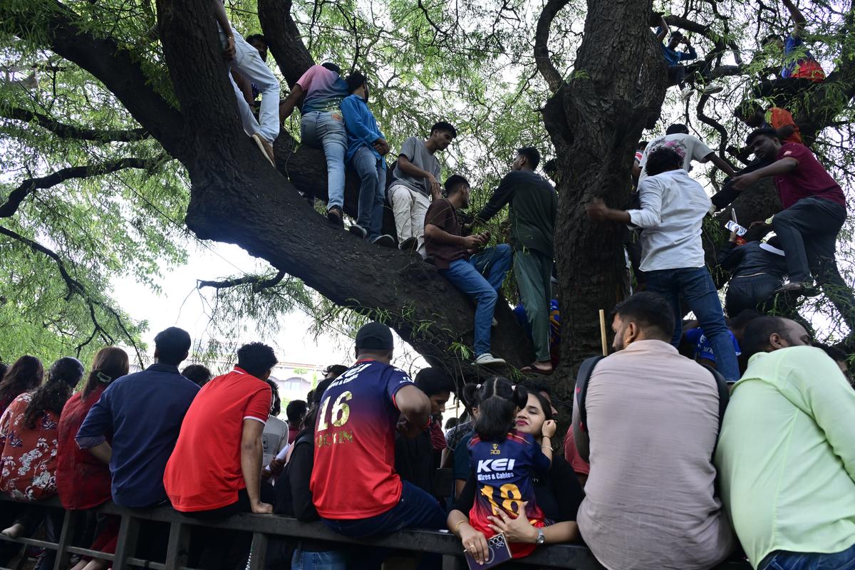Royal Challengers Bengaluru (RCB) fans outside the M. Chinnaswamy Stadium in Bengaluru on June 4, 2025.