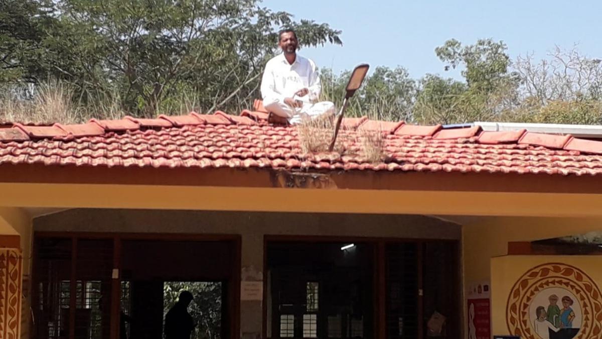 GP president stages dharna on terrace in Shivamogga