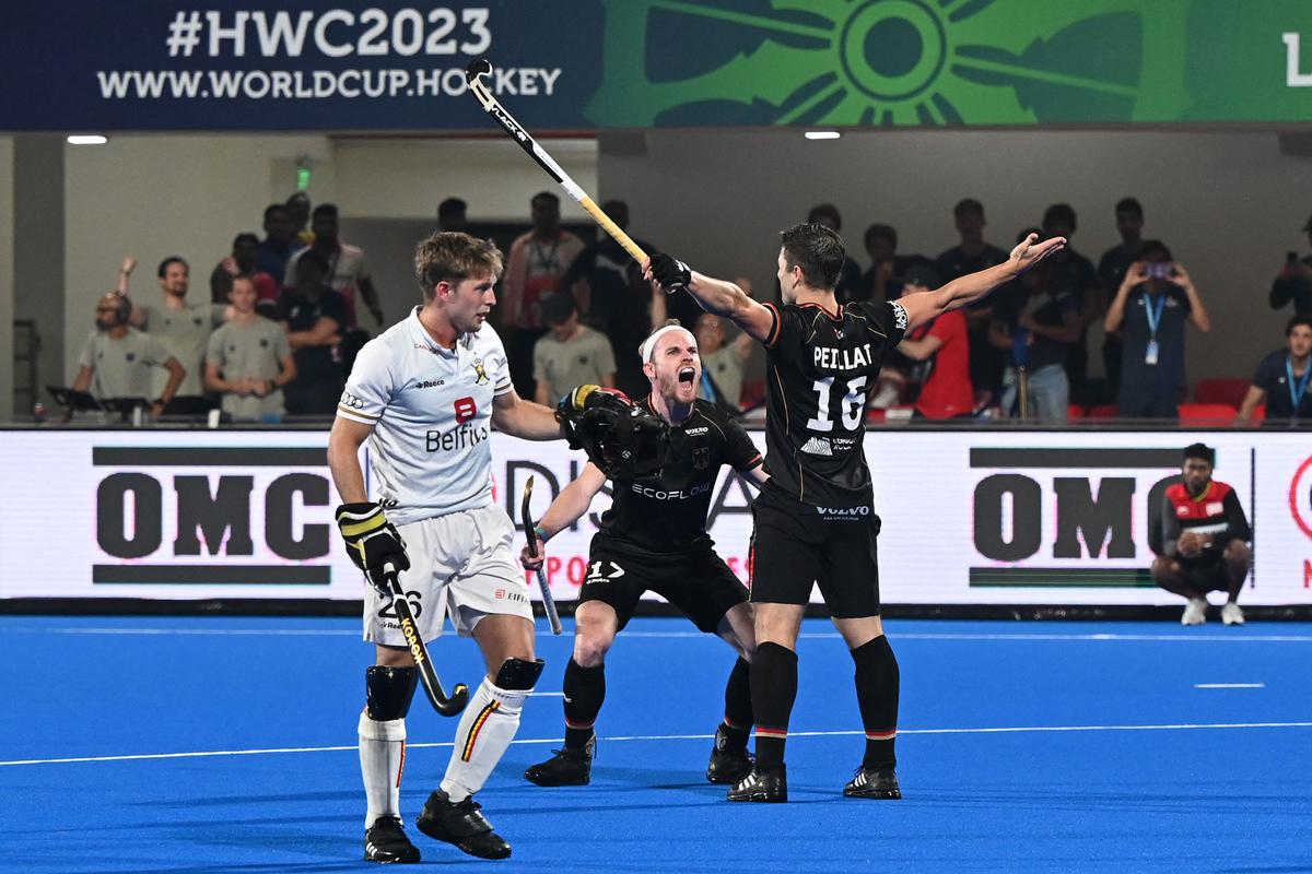 Germany’s players celebrate after scoring their second goal during the FIH men’s Hockey World Cup 2023 final match between Germany and Belgium at the Kalinga Stadium in Bhubaneswar on January 29, 2023. 