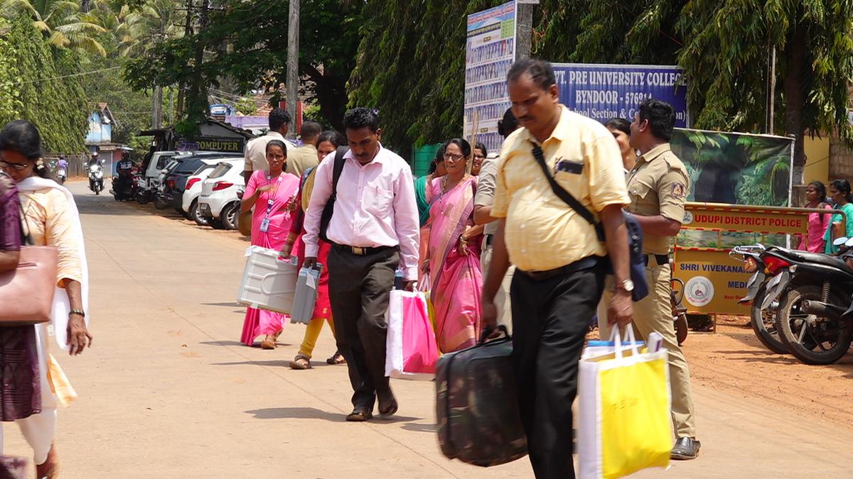 Polling officials leaving for duty from Government Pre-University College, Byndoor, for the Lok Sabha elections in Byndoor Assembly constituency. 