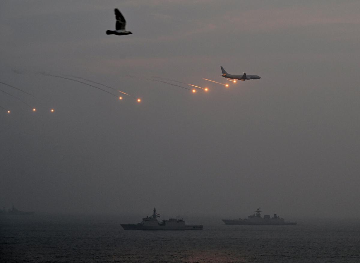 Indian Navy’s aircraft firing flares during the rehearsals of Eastern Naval Command’s operational demonstration in Visakhapatnam.