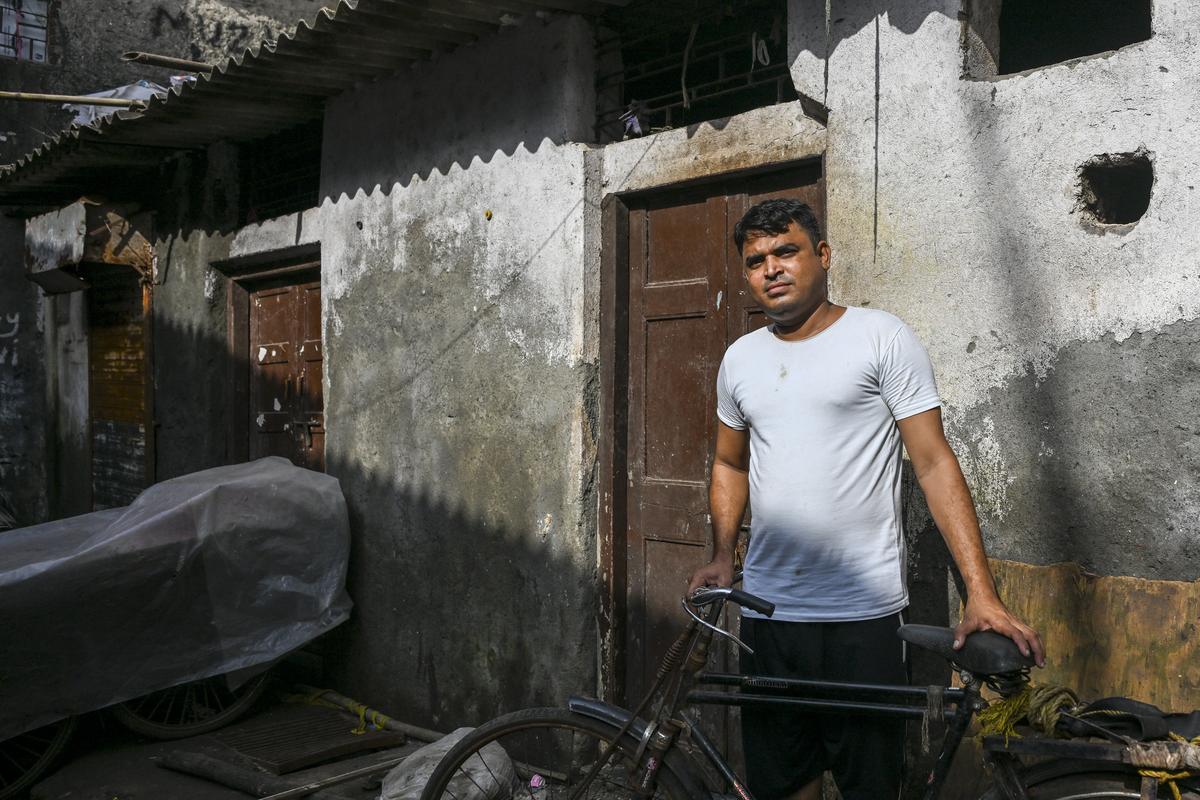 Shabbir Shaikh, outside his workshop in Chamda Bazaar in Dharavi.