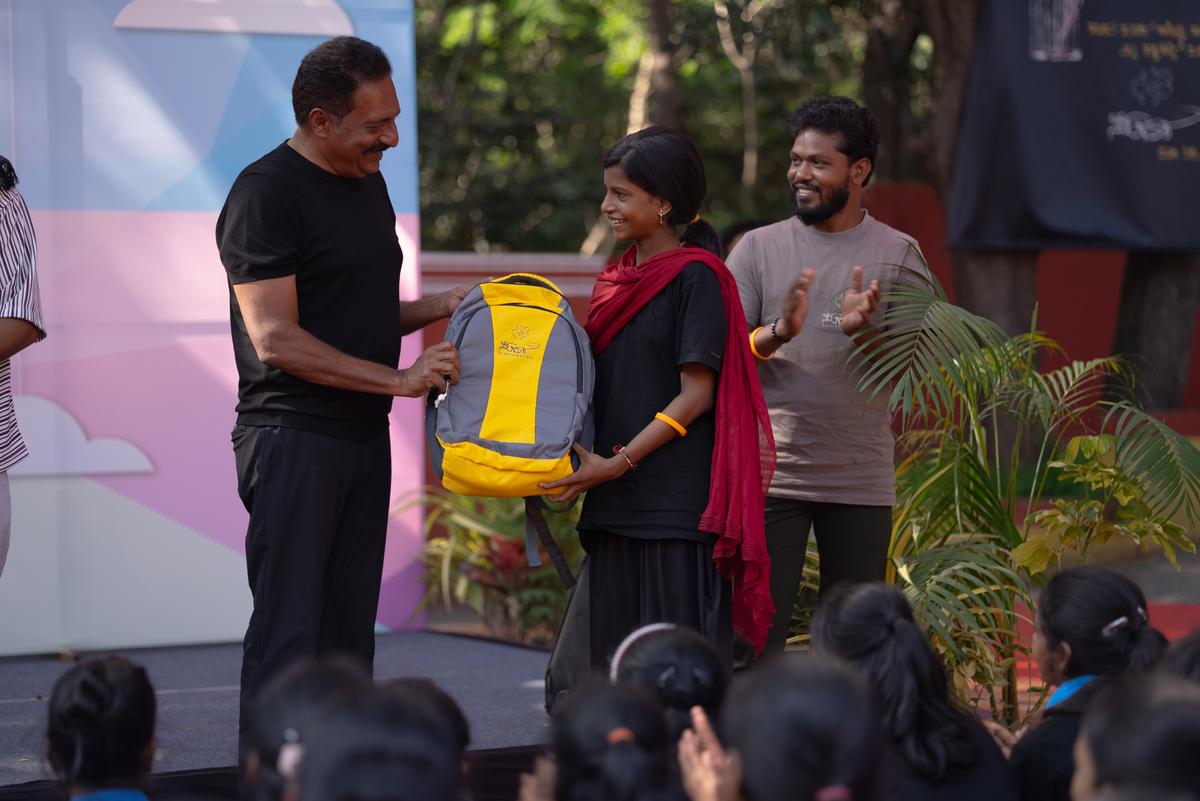 Actor Prakash Raj with children at the Shalaranga Makkala Habba 2024.