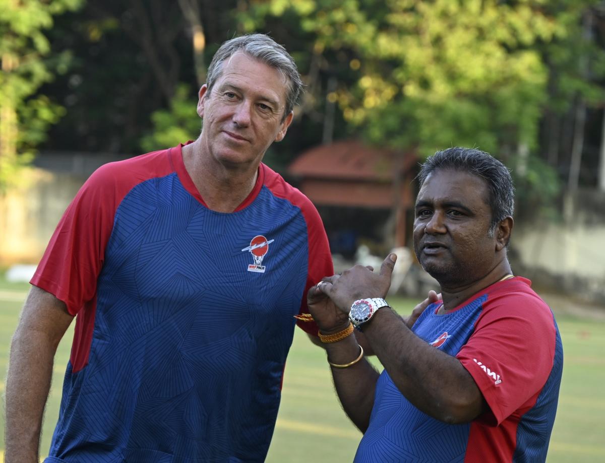 Former Australian cricketer Glenn McGrath with Senthilnathan, head coach MRF Pace Foundation, in Chennai on Thursday, March 13, 2025.