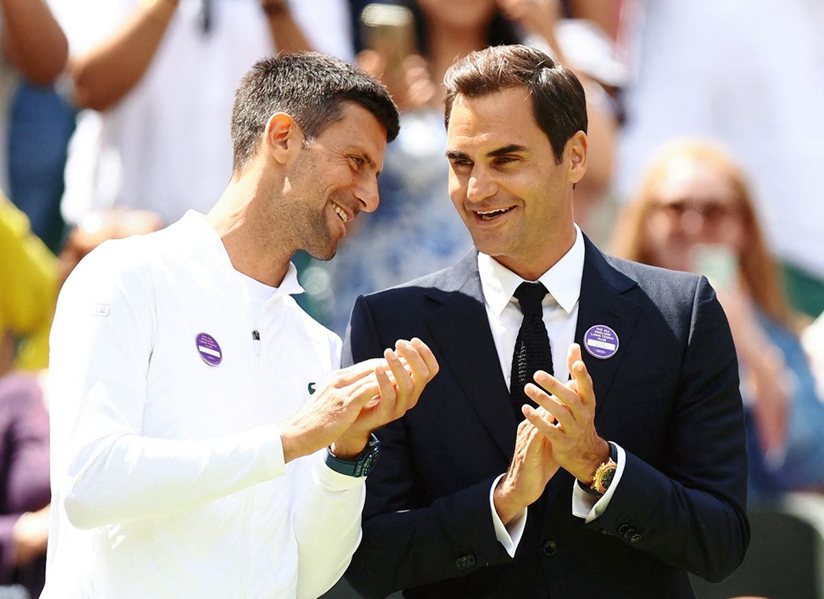 Novak Djokovic (L) and Roger Federer during Centre Court Centenary celebrations at this year’s Wimbledon.