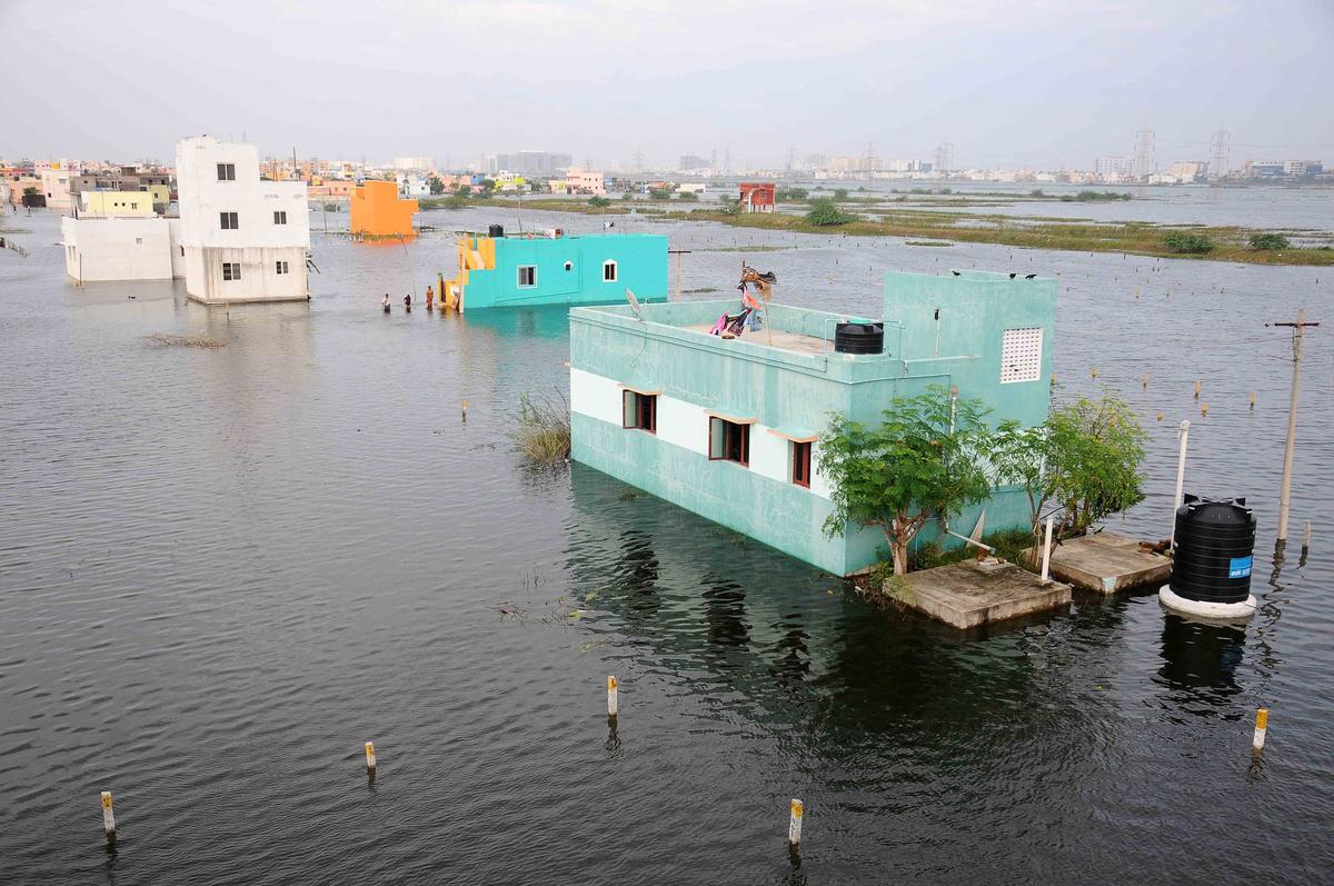 Water surrounds homes in and around Pandian Nagar and Sai Ganesh Nagar, Pallikaranai in Chennai in 2015.