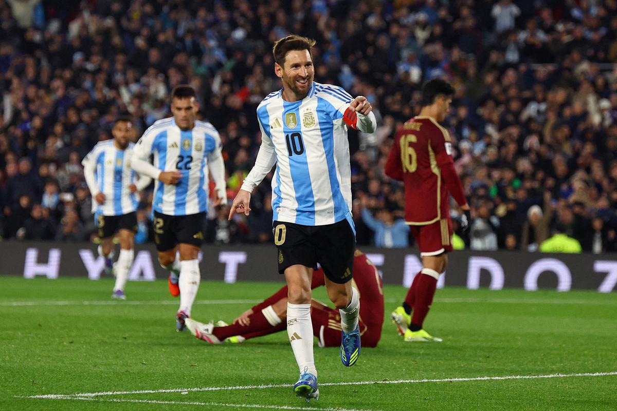 Argentina’s Lionel Messi celebrates scoring their third goal.