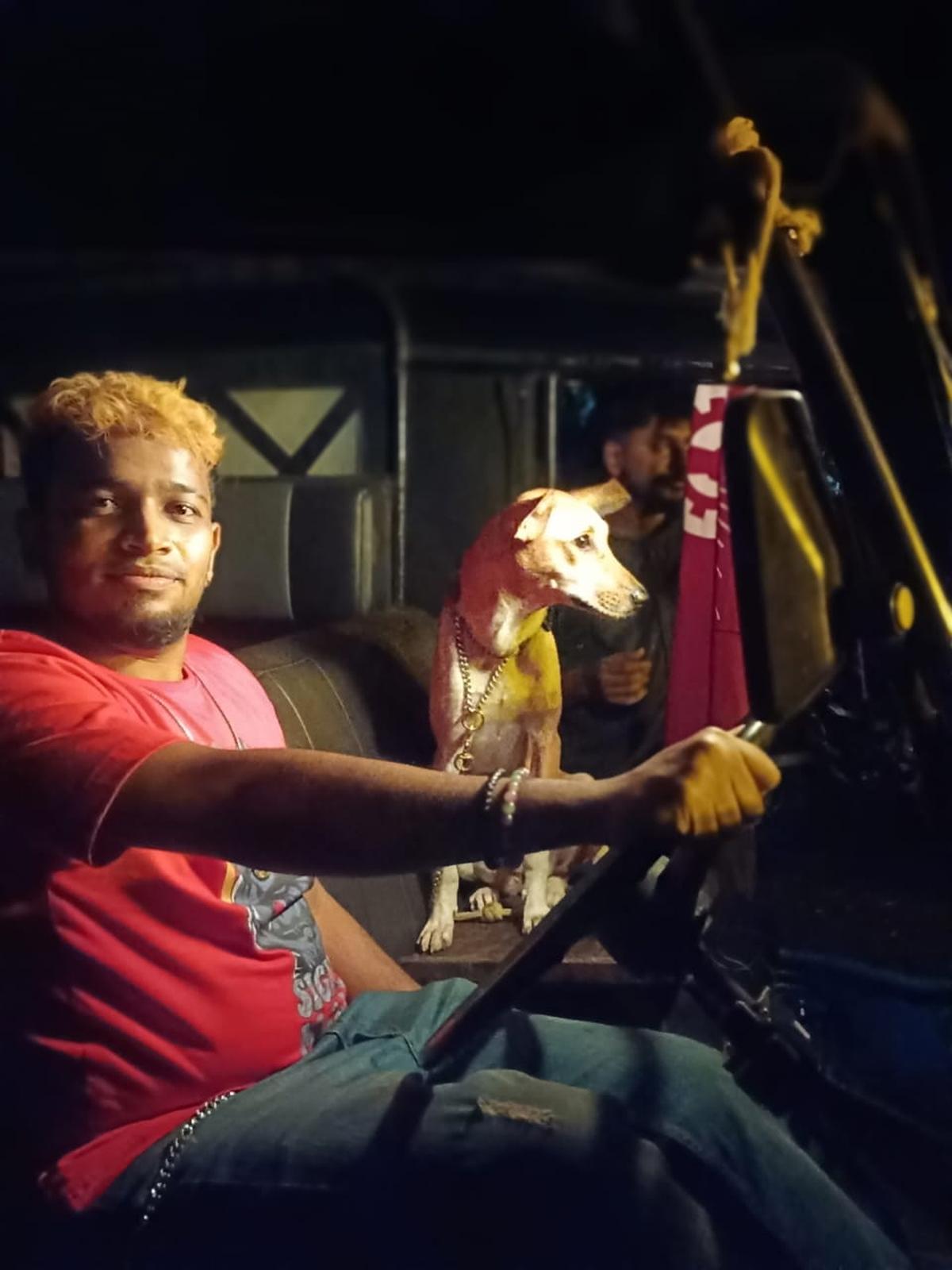 Chill, the indie dog, with actor Basil Joseph on the location of Maranamass Chill, the indie dog, with actor Basil Joseph on the location of Maranamass