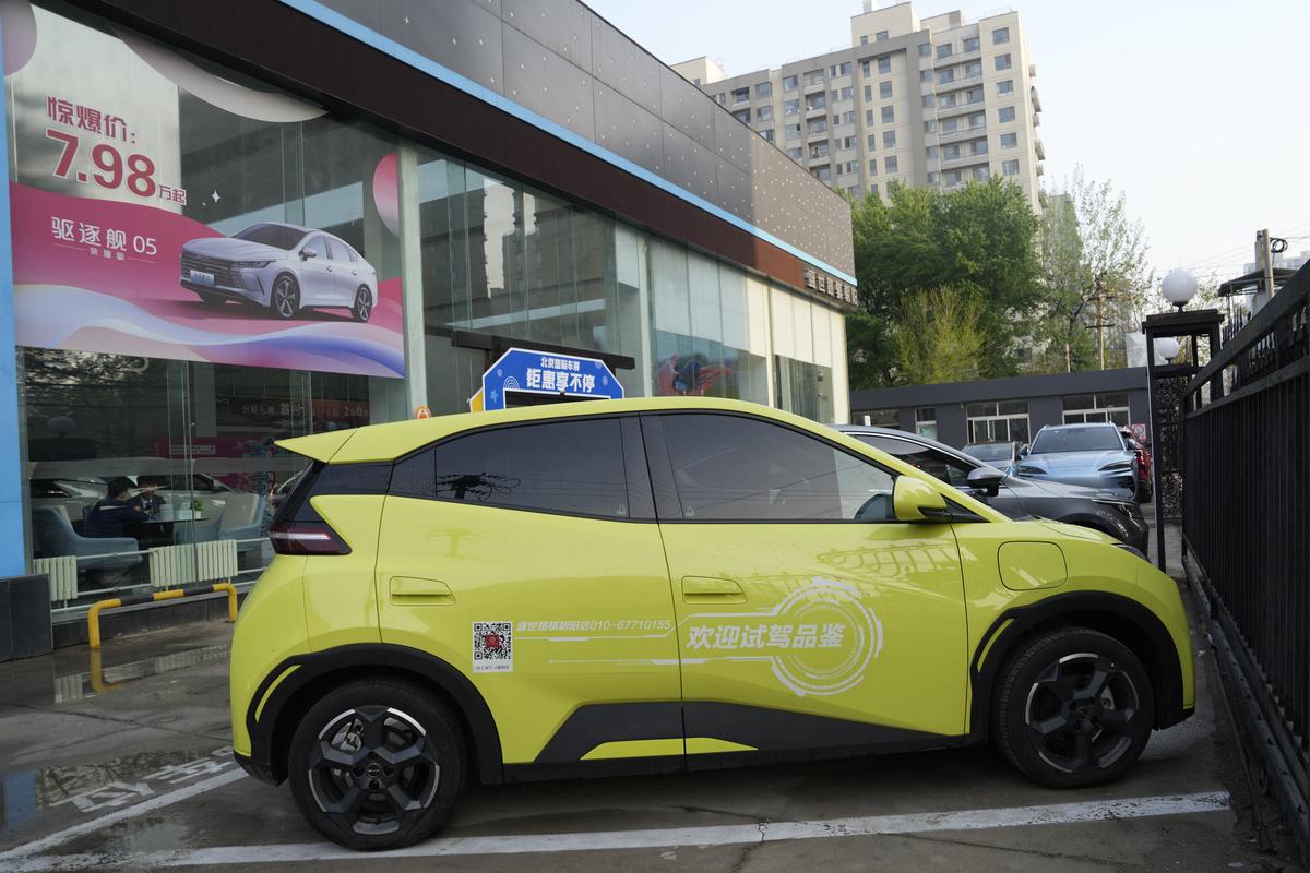 A Seagull electric vehicle from Chinese automaker BYD for test driving is parked outside a showroom in Beijing. The tiny, low-priced electric vehicle called the Seagull has American automakers and politicians trembling. The car, launched last year by Chinese automaker BYD, sells for around $12,000 in China. But it drives well and is put together with craftsmanship that rivals U.S.-made electric vehicles that cost three times as much. Tariffs on imported Chinese vehicles probably will keep the Seagull away from America’s shores for now.