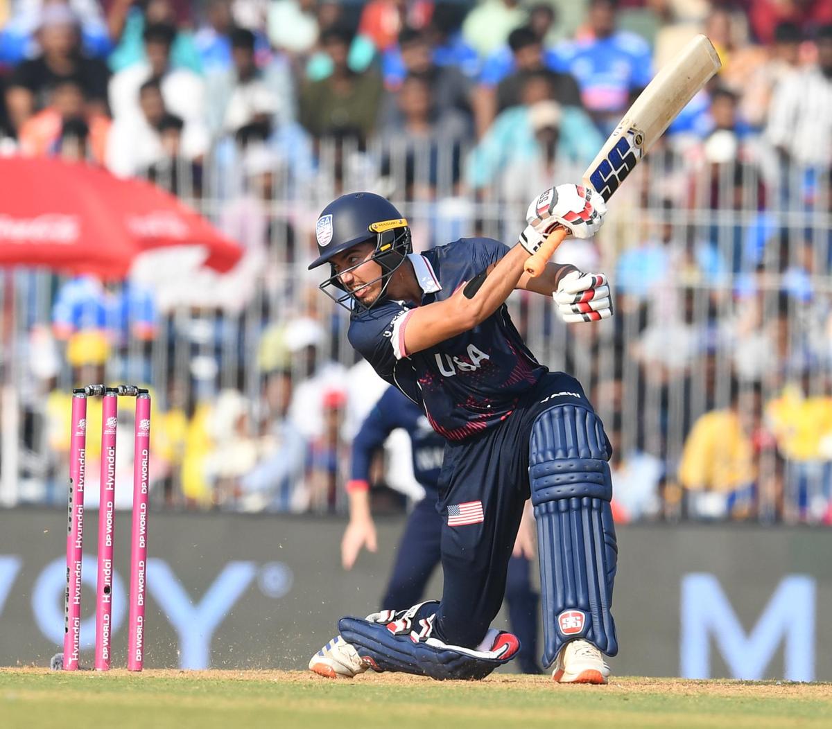 Sanjay Krishnamurthi plays a one-handed shot against Namibia.