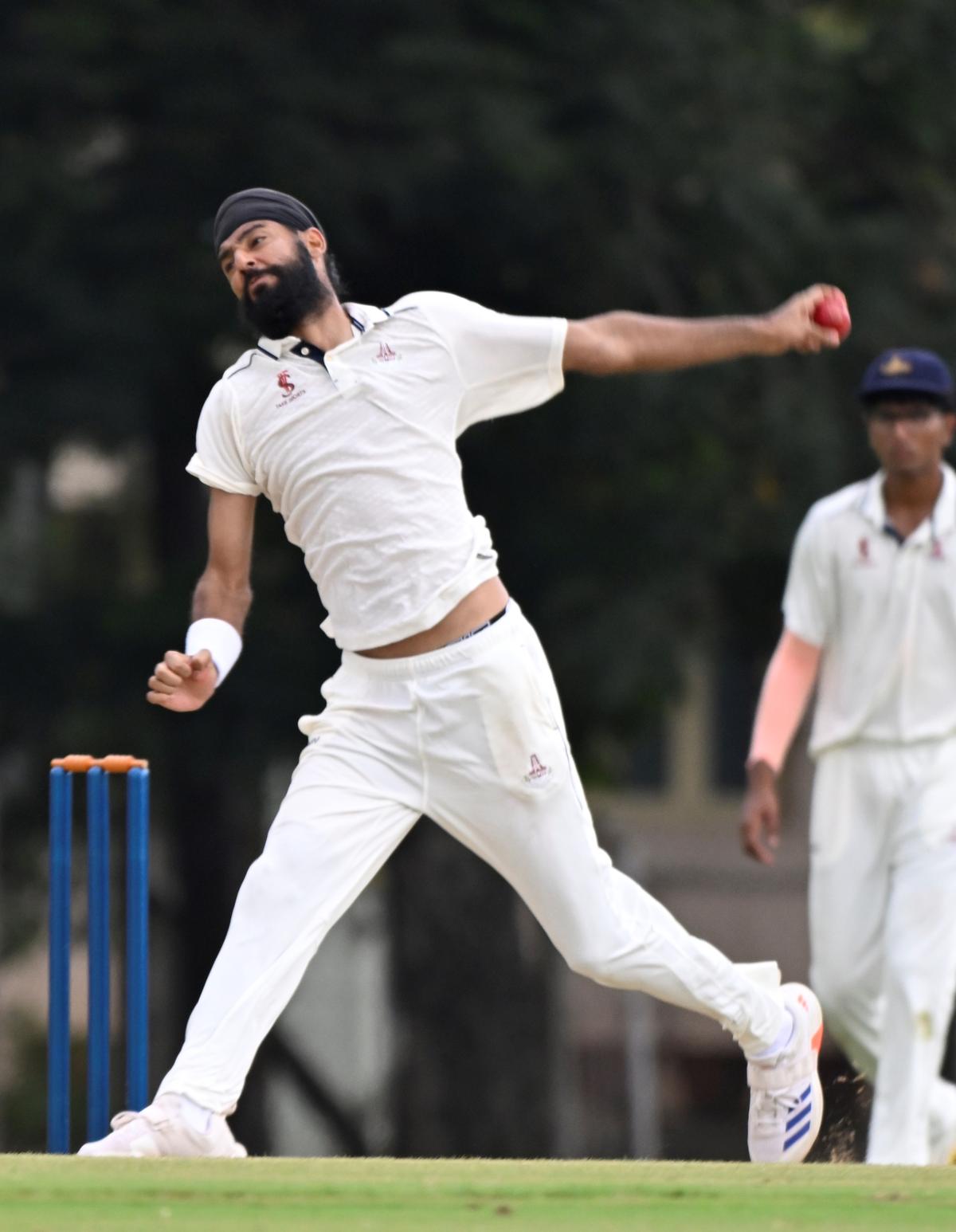 Gurjapneet Singh of Tamil Nadu took four wickets against Jharkhand on the second day of their Elite Group-A Ranji Trophy first round match at Sri Ramakrishna College of Arts and Science ground in Coimbatore on Thursday, October 16, 2025. 