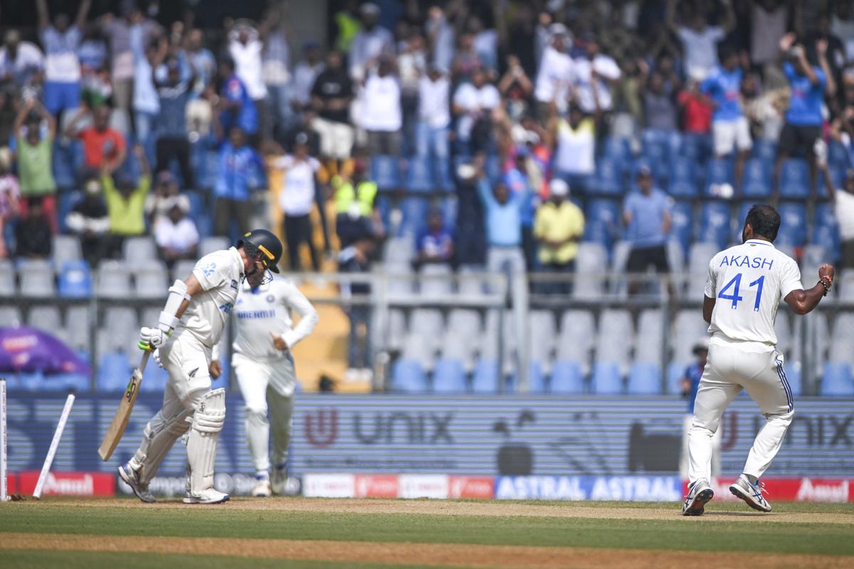 Express delivery: Akash Deep celebrates the dismissal of Tom Latham on day two of the third Test between India and New Zealand at the Wankhede Stadium in Mumbai  on November 2, 2024.