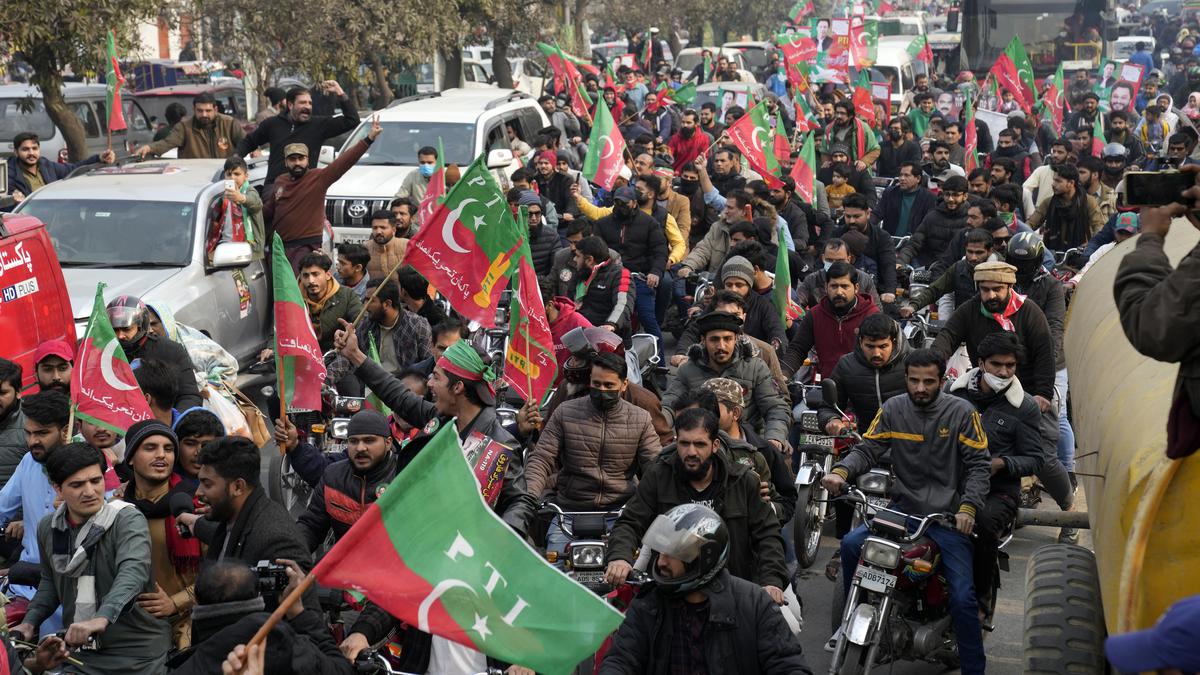 Pakistani police use tear gas to disperse pre-election rally by supporters of former leader Khan