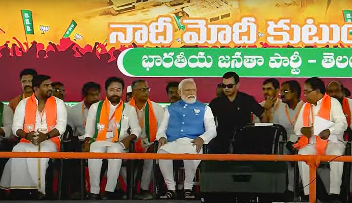 Prime Minister Narendra Modi with Union Minister and Telangana BJP president G. Kishan Reddy and others during a public meeting ahead of Lok Sabha elections, in Nagarkurnool, Telangana.