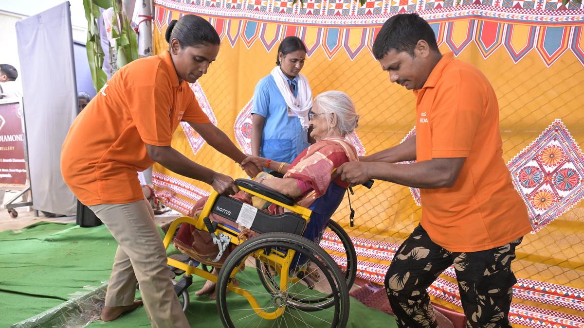 Police Seva Dal members help senior citizens, differently-abled get free darshan of Goddess Kanaka Durga during Dasara