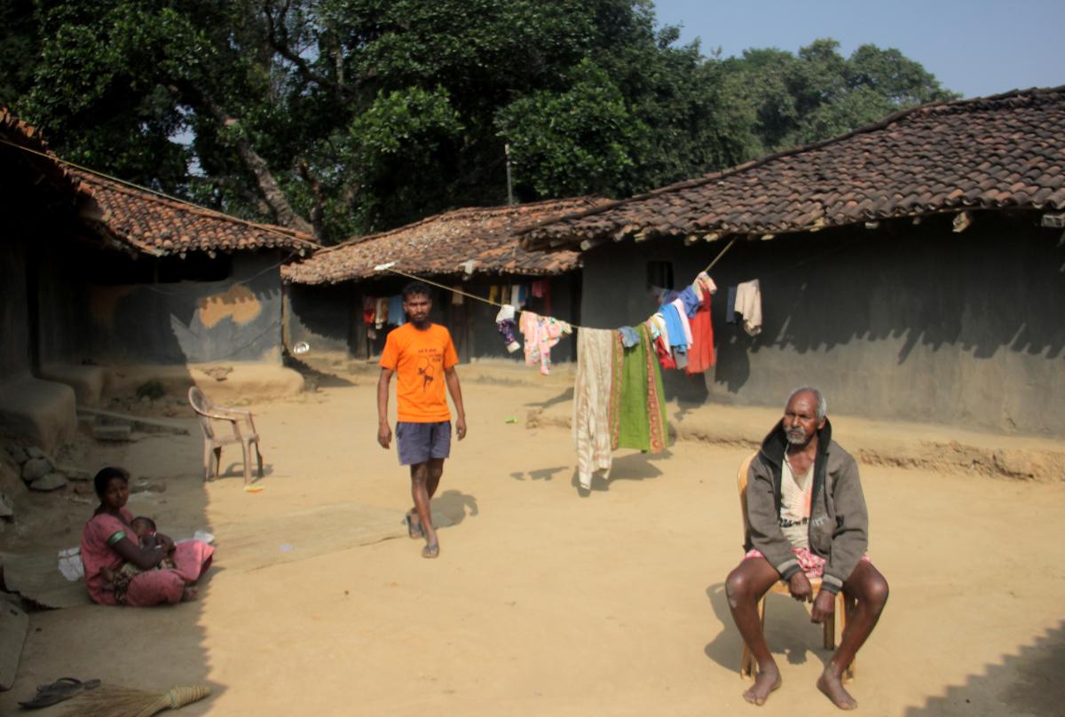 Blasos Lakra (right), his son and daughter at their home at Lulkidihi in Odisha’s Sundargarh district.
