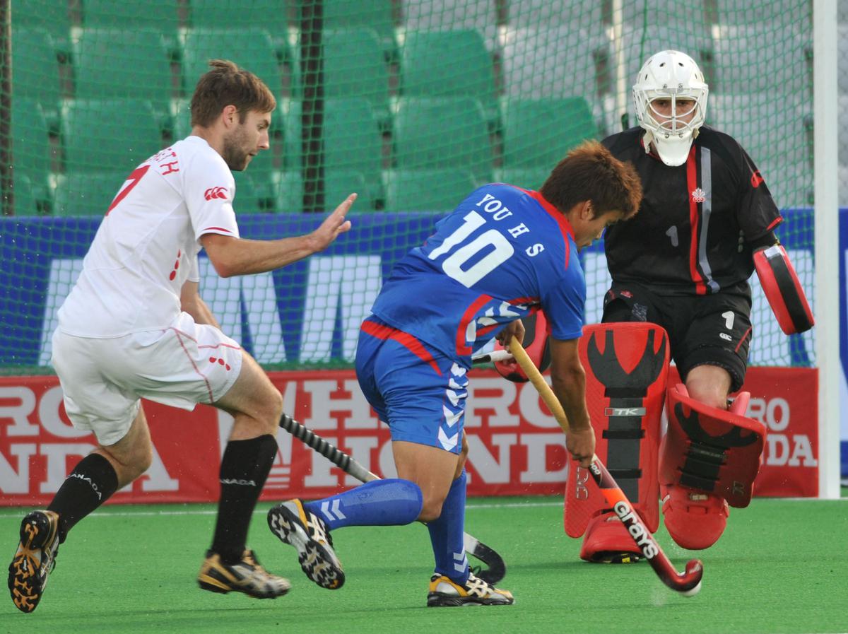 Korea’s  You Hyo-Sik scoring his first goal against Canada  during their match in the Hero Honda FIH Hockey World Cup Tournament at the Major Dhyanchand National Hockey stadium in New Delhi, on March 7, 2010. 