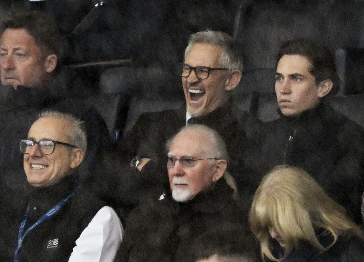 Former player and TV presenter Gary Lineker is pictured on the stand with his son.