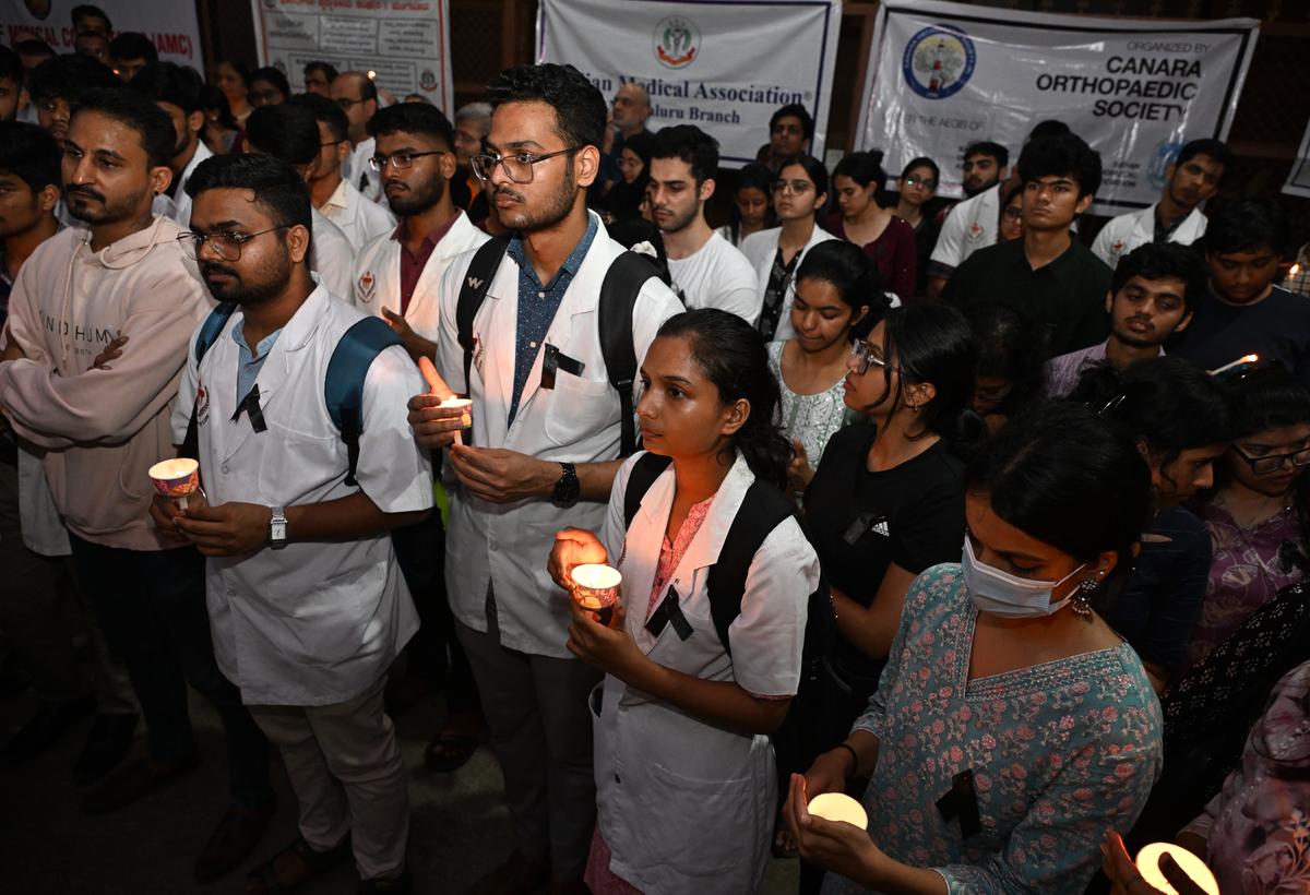 Doctors under the auspices of the Mangaluru branch of the Indian Medical Association stage a candle light march and protest in Mangaluru on August 13 to condemn the rape and murder of a medical student while on duty in Kolkata.