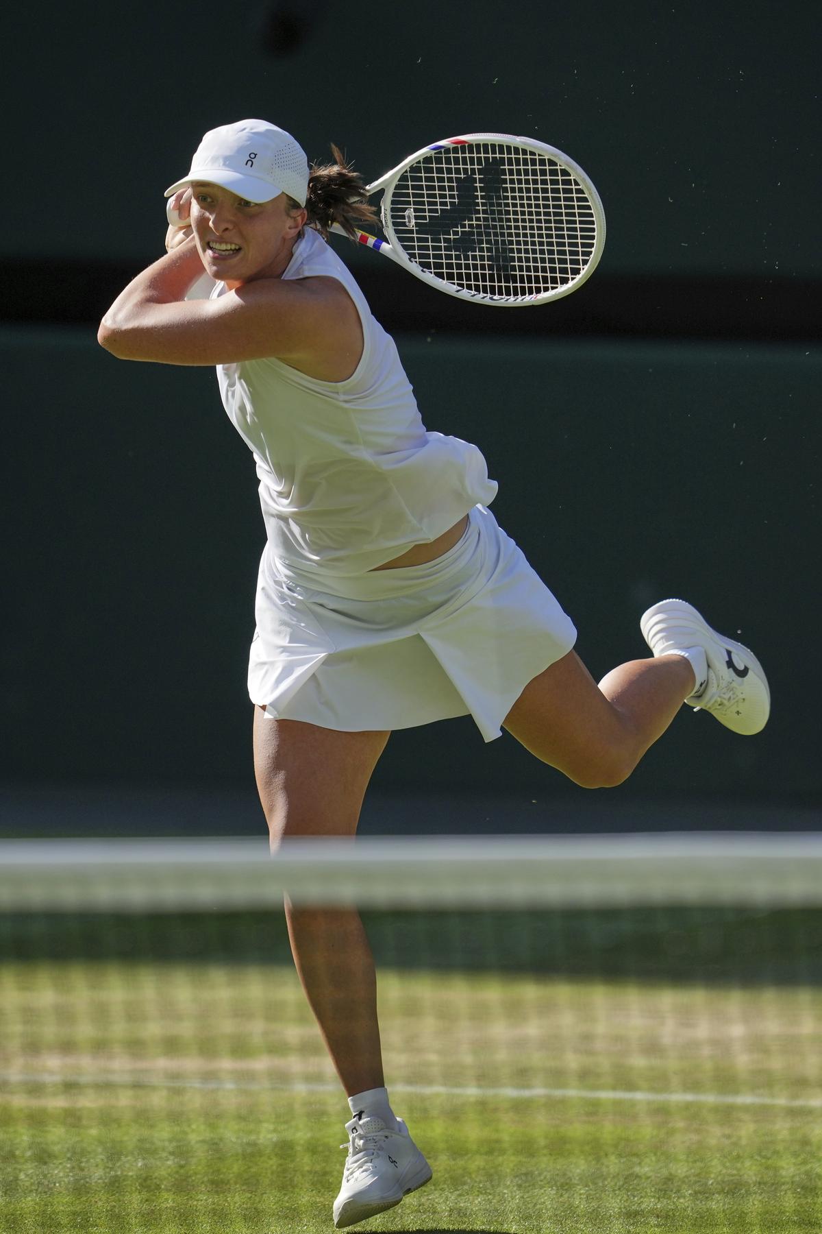 Iga Swiatek blew away Belinda Bencic’s challenge to reach her first Wimbledon final. Iga Swiatek blew away Belinda Bencic’s challenge to reach her first Wimbledon final.