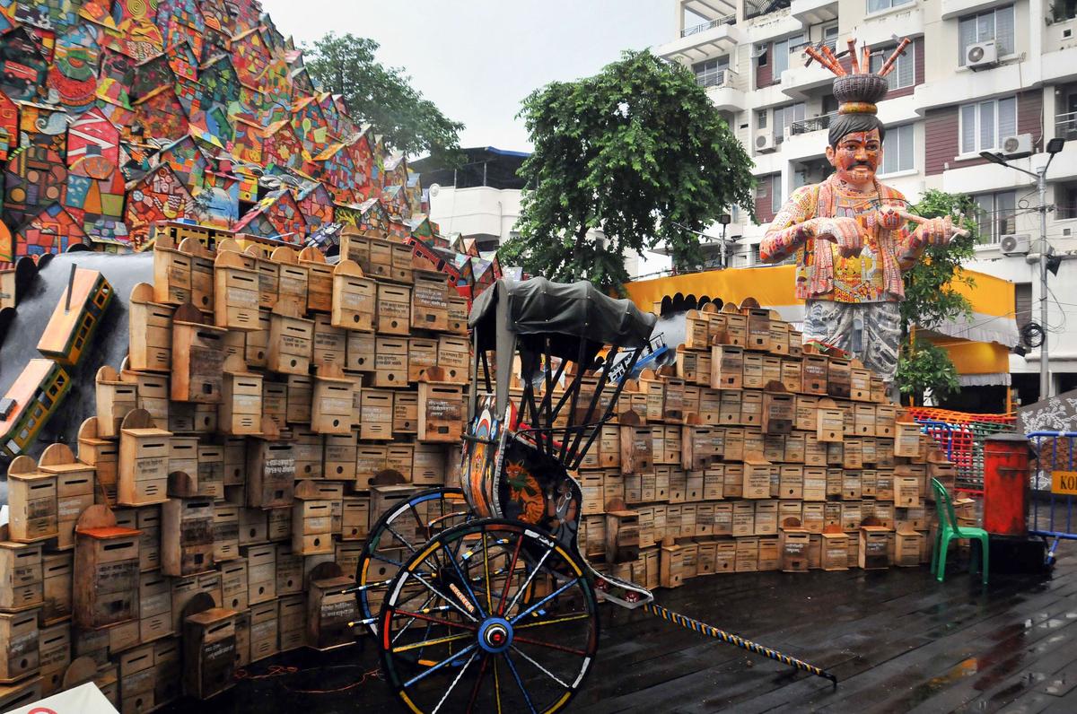 A Durga Puja pandal themed on letter-box during the ongoing Durga Puja festival, at Chetla Agrani, in Kolkata.