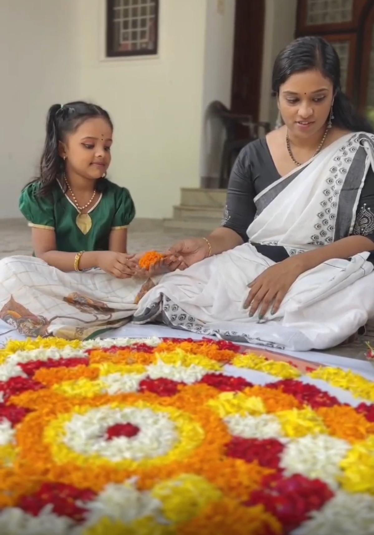 Printed pookkalam design from Koottu