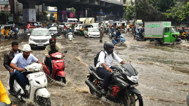 Intense rain spell turns streets into streams in Hyderabad