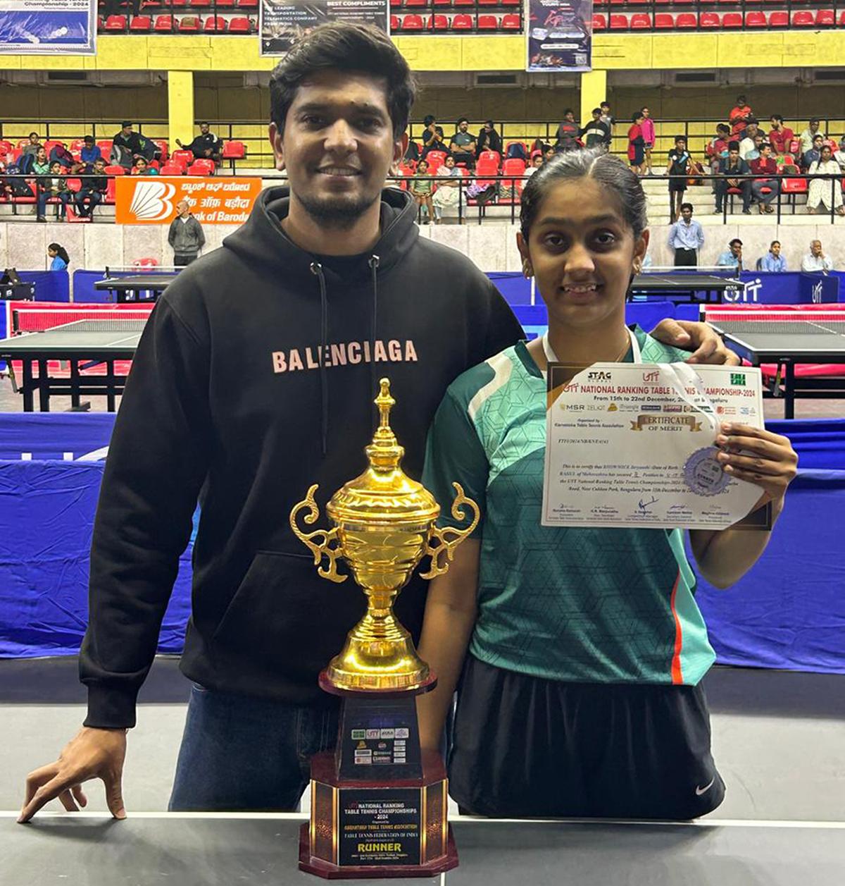 Divyanshi with her coach Anshuman Roy. Divyanshi with her coach Anshuman Roy.